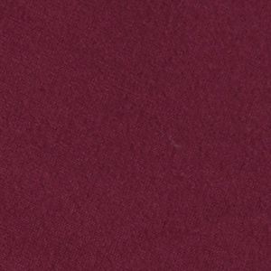 Close-up of deep burgundy lace dress fabric showing intricate textile texture and weave
