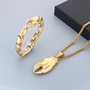 Parure de bijoux en acier inoxydable doré avec collier et bracelet à pince de crabe