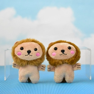 Pair of cute plush lion keychains with soft texture and pink cheeks decoration