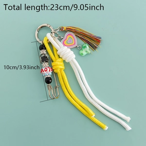 Pink heart macrame keychain with yellow tassels and rhinestone details, length 23cm