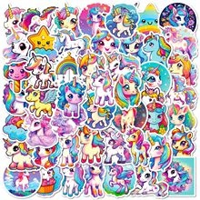 Close-up detail of cartoon unicorn and rainbow stickers with vibrant colors and patterns