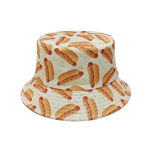 Detail showing white bucket hat with all-over hot dog print and vibrant summer pattern