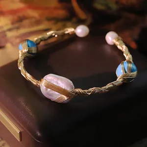 Handcrafted baroque pearl and turquoise bangle in vintage gold wire-wrapped design