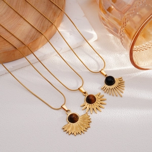 Bohemian sunburst necklaces with natural stone pendants on gold snake chains