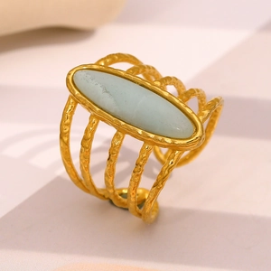 18K gold plated stainless steel wave ring with oval light blue natural stone accent