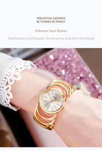 Detail of a gold-toned ladies bracelet watch with open-link strap on a model wrist