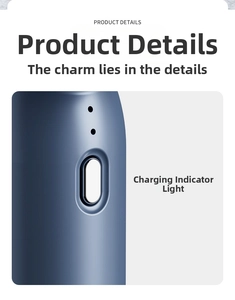 Macro detail of dark blue handheld fan showing matte finish and charging indicator light