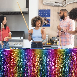 Rainbow fringe table skirt with iridescent metallic tinsel for party decoration