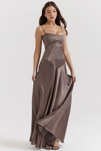 Detail of slim fit bronze satin evening dress showing the fabric texture and drape