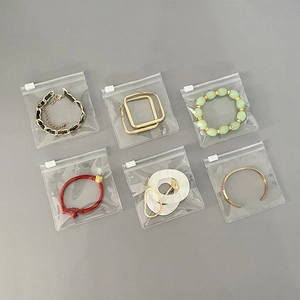 Detail view of a 6-piece jewelry set individually packed in transparent PVC sealer bags