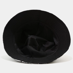 Close-up of the interior structure and soft black lining of this bucket hat