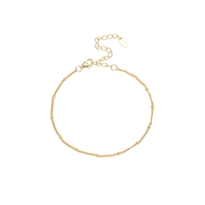 Close-up detail of S925 sterling silver stamp on golden beaded chain link bracelet