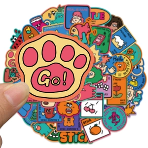 50 colorful cartoon doodle stickers pack featuring PVC waterproof material for skateboard