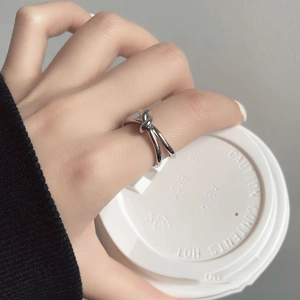 Irregular metal knot open ring for women featuring minimalist aesthetic design