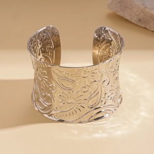 Chunky silver open cuff bracelet with embossed paisley floral patterns for women