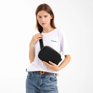 Minimalist black large capacity sports waist bag with gold zipper for women crossbody
