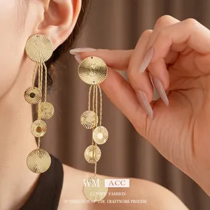 Luxury gold round textured tassel earrings with minimalist geometric metallic fringe drop