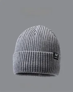 Detailed ribbed knit beanie with brand label and color palette showing 8 shades