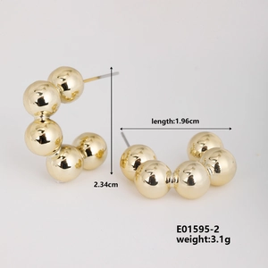 Detailed view of gold C-shaped bead earrings with size dimensions 2.34cm by 1.96cm