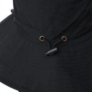 Detail of adjustable drawstring and reinforced stitching on a black outdoor sun hat