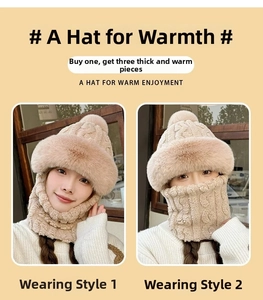 Detail of knit cable pattern and faux fur trim on the warm beige winter hat scarf set