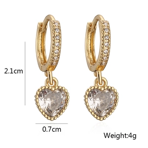 Detail view of gold-plated heart drop earrings with dimensions of 2.1cm and 4g weight