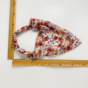 Floral satin triangular headscarf with elastic band shown with ruler for size reference