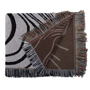Bohemian double-sided jacquard woven blanket with black and white vortex pattern and tassels