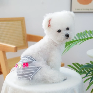 Detail view of grey striped dog sanitary pantie with lace trim and pink bow for small dogs
