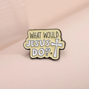 Minimalist enamel pin featuring What Would Jesus Do text and white cross on cream base