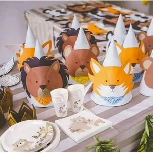 Jungle animal party tableware set featuring bear plates, cups, and hats for birthday decor