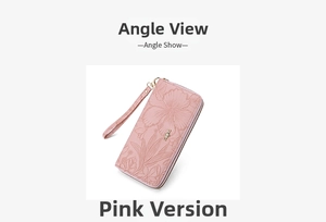 Close-up of pink long wallet featuring floral embossing and a cat-shaped metal tag