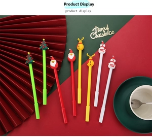 Detail of Christmas cartoon pens featuring Santa, reindeer, snowman, and tree on festive decor