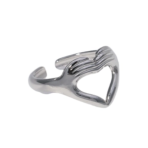Silver stainless steel open ring with heart hand gesture design from a 45-degree angle