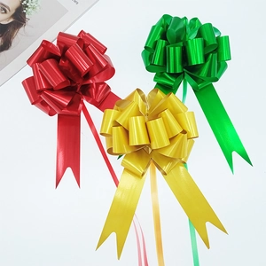 Three metallic gift pull bows in red gold and green for Christmas gift wrapping 3x120cm