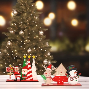 Wooden Christmas table ornaments featuring Santa Claus, reindeer, and colorful trees