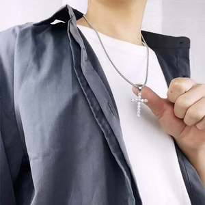 Titanium steel cross necklace for women featuring sparkling white cubic zirconia stones