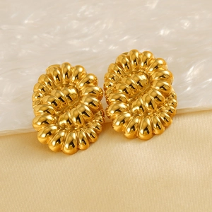 Boucles d'oreilles vintage en acier doré 18 carats avec texture ovale torsadée