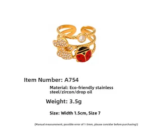 Detailed view of 18k gold plated insect ring featuring a ladybug and zircon flower