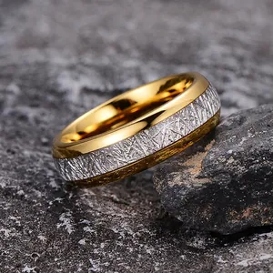 Tungsten steel ring with dual-tone rime texture finish on a grey rock background