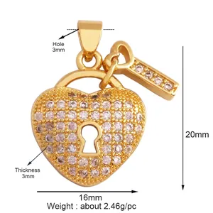 Detailed view of micro-pave heart lock and key pendant with precise size measurements