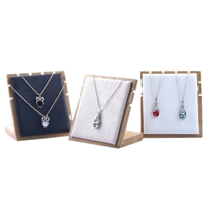 Bamboo necklace display stand set with velvet inserts in blue, grey, and white colors