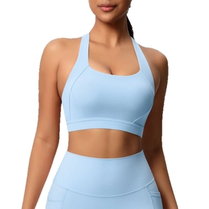 Lichtblauwe sport-bh en legging set met telefoonzakken voor yoga en fitness training