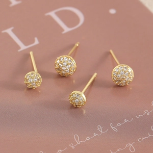 Luxury geometric round ball stud earrings with gold plating and paved white zircon stones
