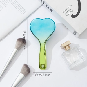 Gradient blue heart-shaped air cushion hairbrush for women measuring 15.8cm by 8cm