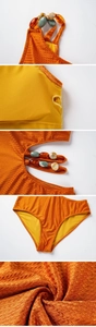 Detail of caramel swimsuit with honeycomb texture and decorative colorful beads
