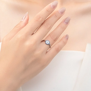 Elegant S925 sterling silver ring featuring a blue evil eye stone inlay for women