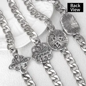 Vintage silver punk Cuban chain necklace with gothic charms shown from the back view
