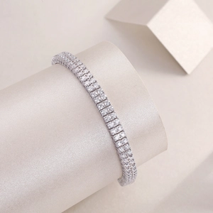Detail view of double-row tennis bracelet with brilliant-cut cubic zirconia in silver finish