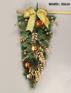 Detail of 30cm Christmas wall swag with golden bow, pine needles and ornaments
